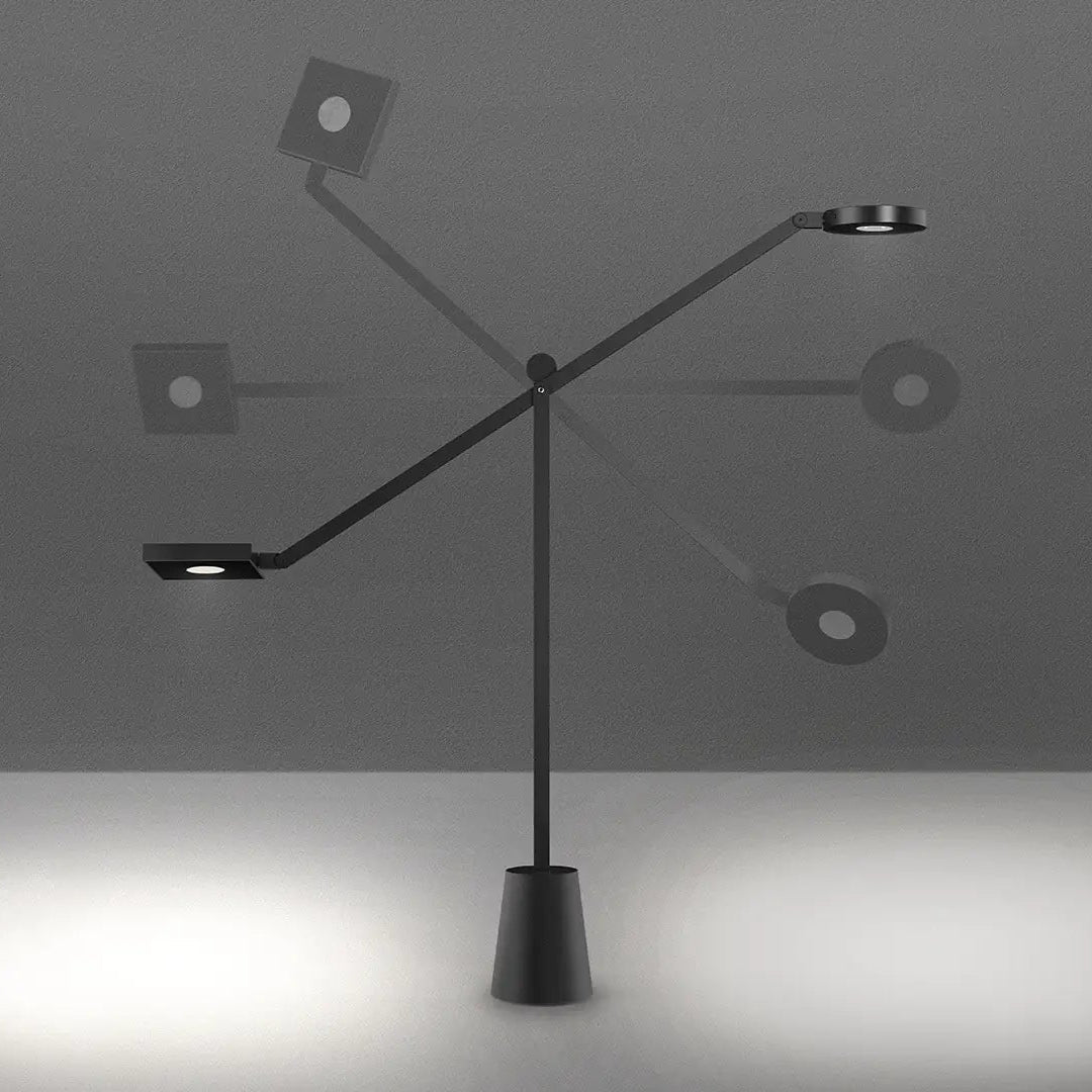 artemide equilibrist lampada da tavolo in movimento su sfondo grigio