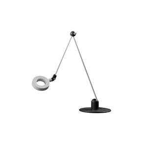 Lampada da tavolo L'Amica di Martinelli Luce in colore grigio con dettagli neri su sfondo bianco.